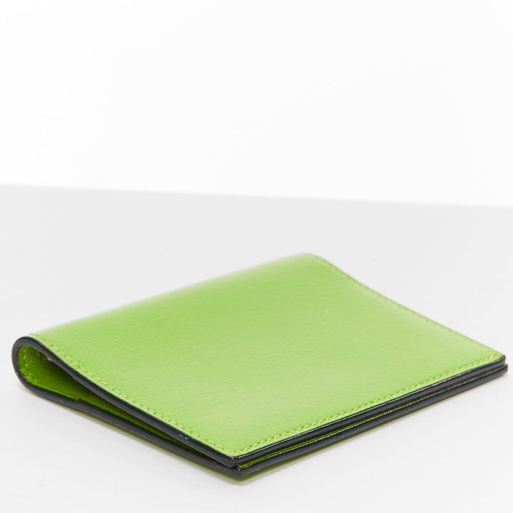 HERMES neon green smooth leather silver hardware bifold cardholder
