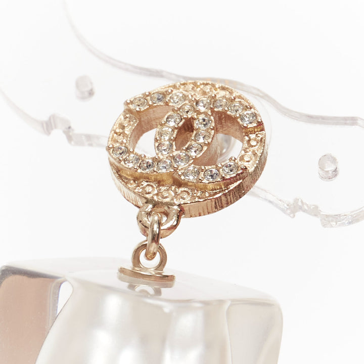 CHANEL A19K CC crystal clear acrylic encased white pearl pin earrings Pair