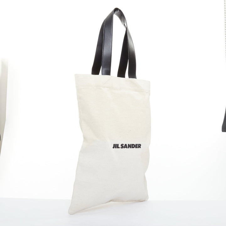 JIL SANDER Logo Print Canvas Long Tote beige canvas black leather trim bag