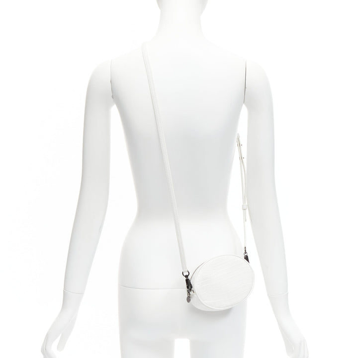 FERIDA YANG Emma white matte scaled leather oval crossbody belt bag