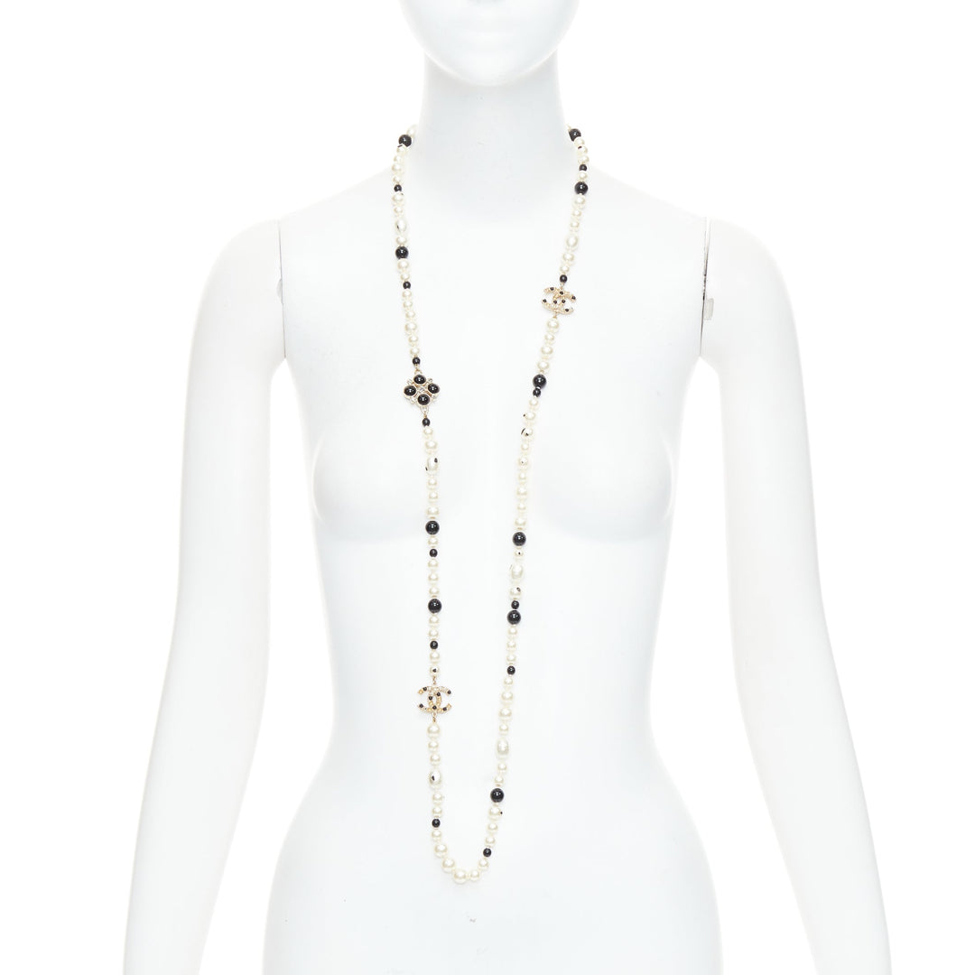 CHANEL 08P black Camelia enamel station faux pearl CC long necklace