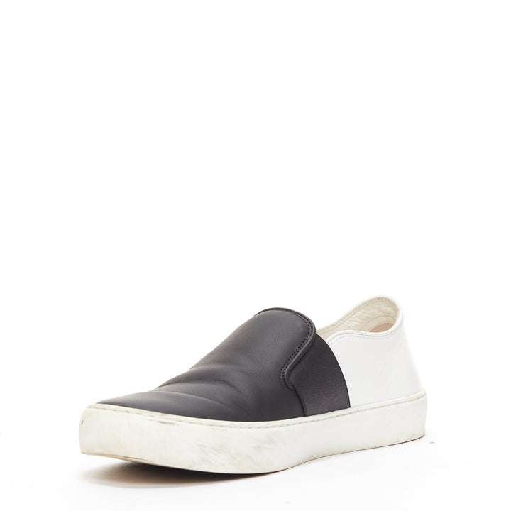 CHANEL black white leather CC logo back minimal classic skates sneakers EU36