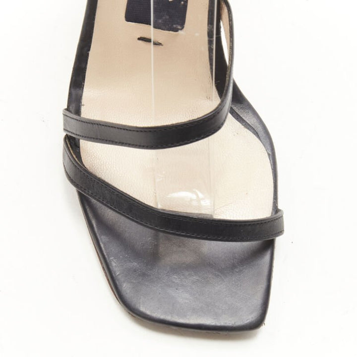 JACQUEMUS architectural wood block gold ring black strappy heel EU36