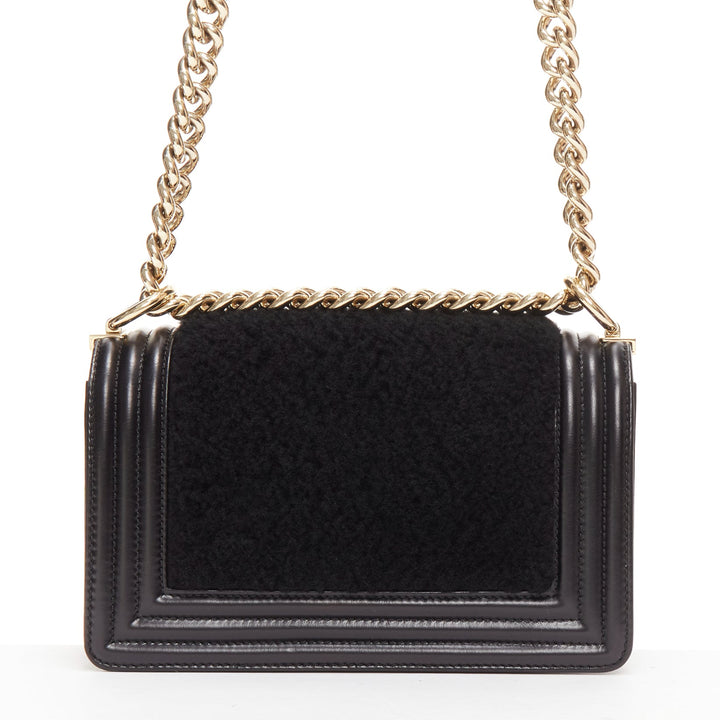CHANEL Boy Small black shearling leather gold CC push lock chain flap bag