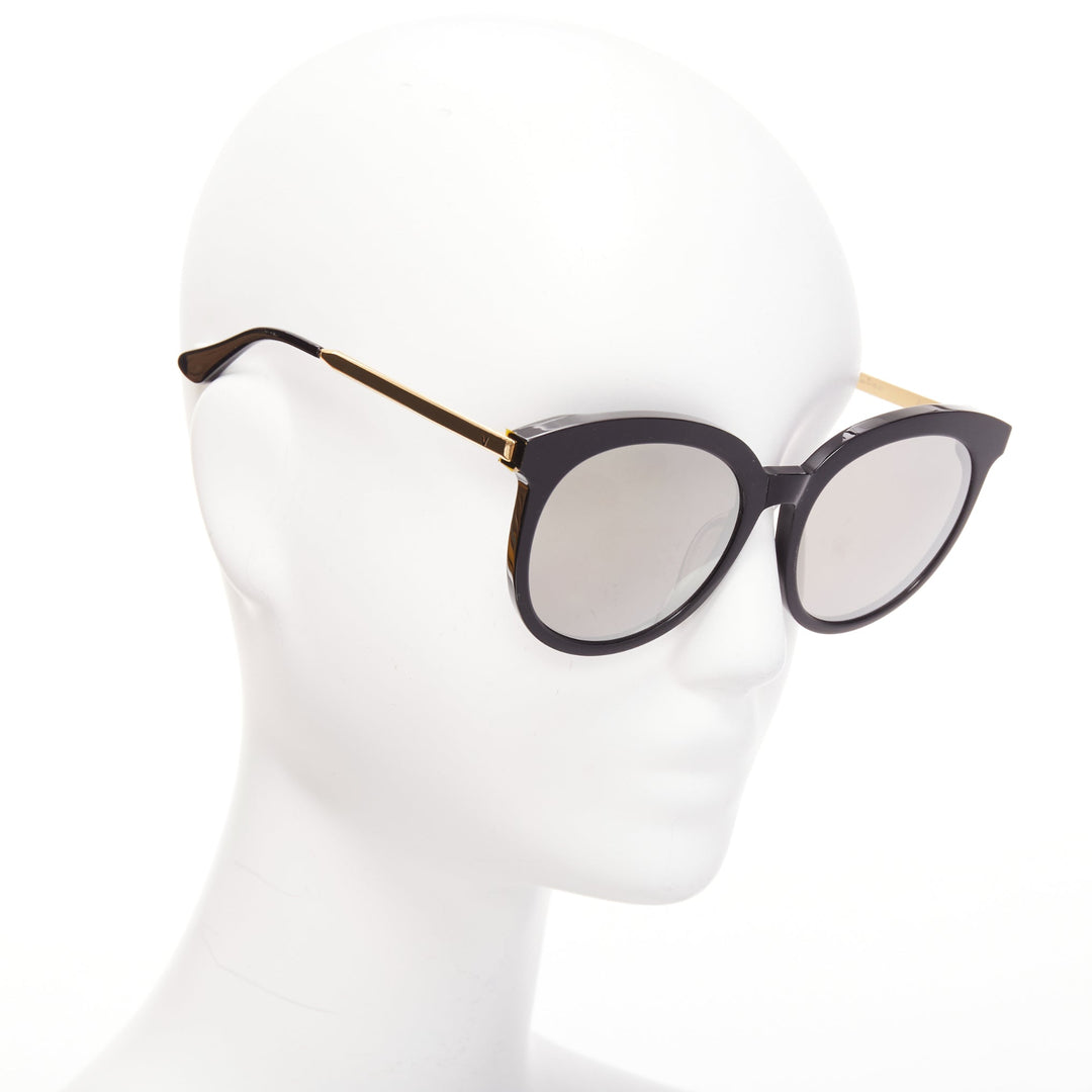 GENTLE MONSTER Lovesome black reflective lens gold oversized sunglasses