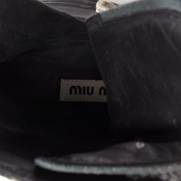 MIU MIU Runway black leather logo lace up chunky wedged military boots EU39
