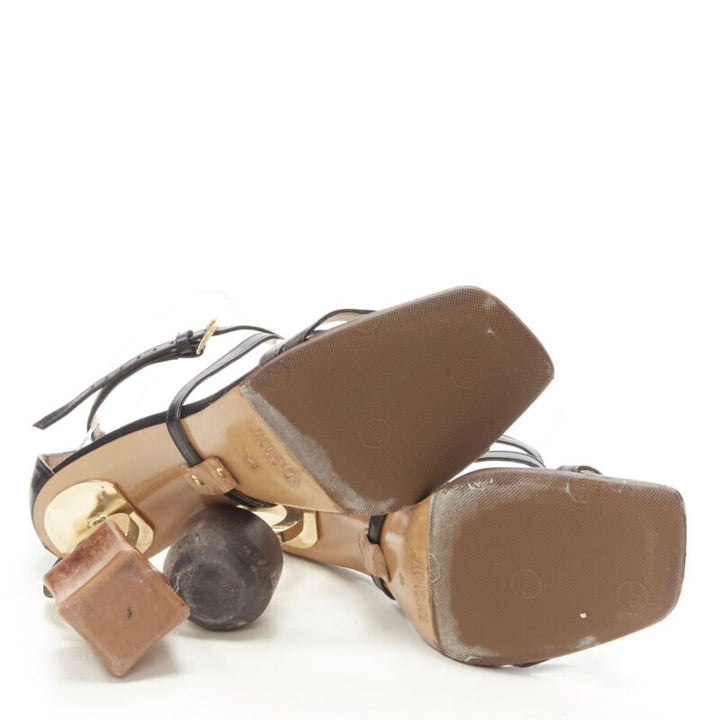 JACQUEMUS architectural wood block gold ring black strappy heel EU36