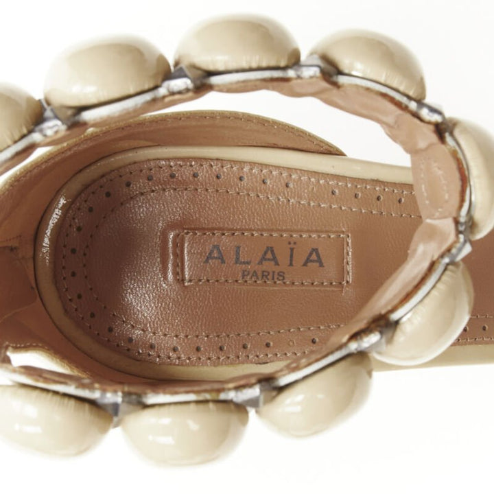 ALAIA La Bombe ball embellished studded nude patent high heel sandal EU37.5