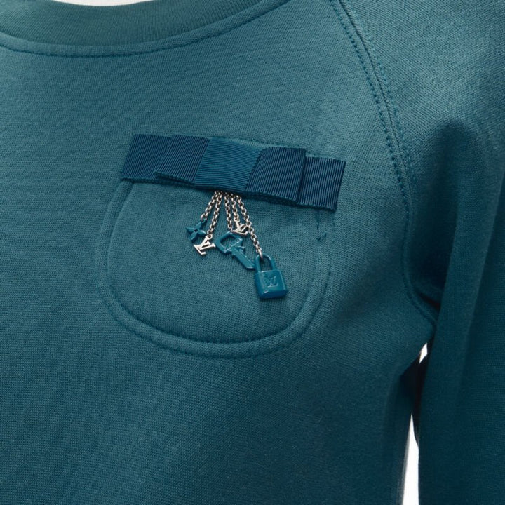 LOUIS VUITTON teal blue bow lock charm patch pocket cotton fleece sweater S
