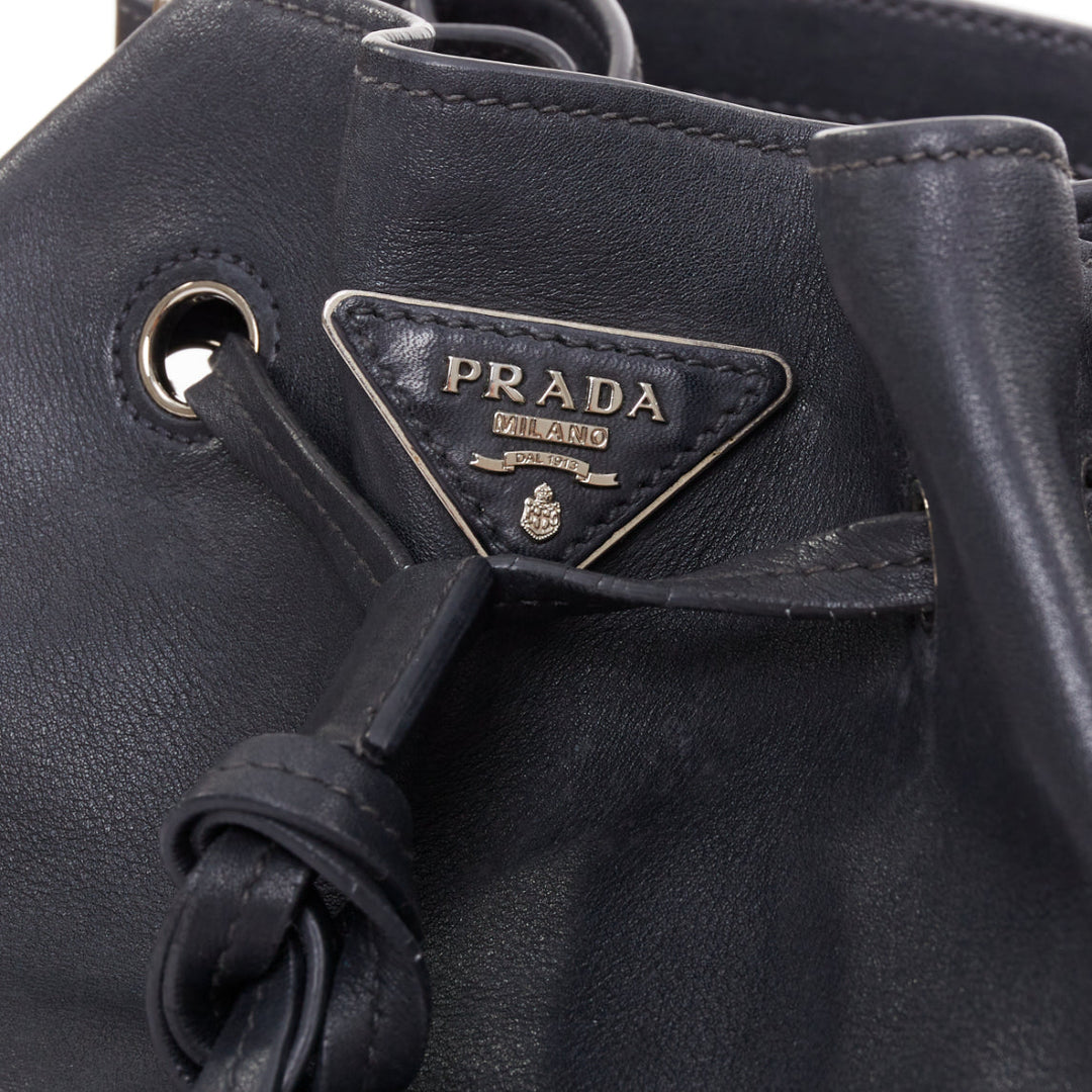 PRADA City Calf Bucket black calfskin leather triangle tassel drawstring bag