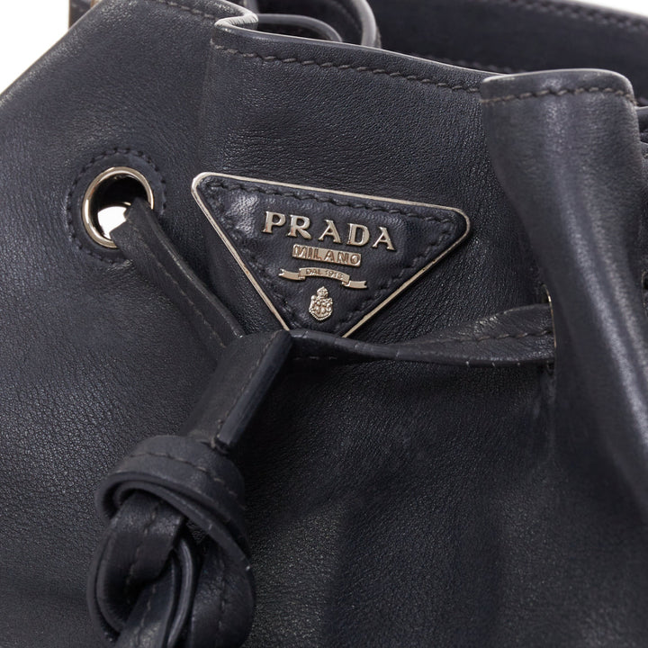 PRADA City Calf Bucket black calfskin leather triangle tassel drawstring bag