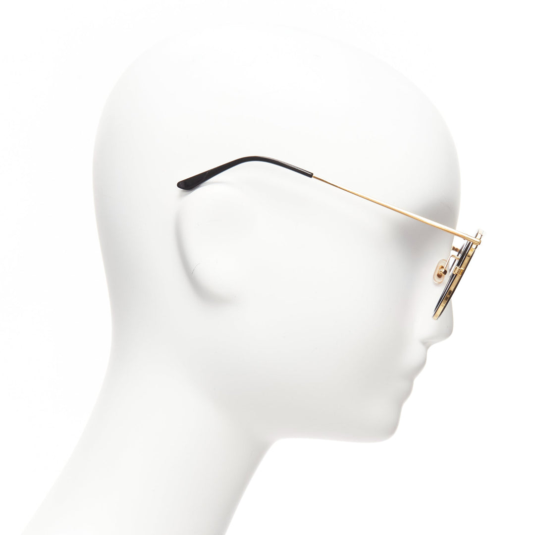 GENTLE MONSTER TOME Supernature gold black cateye reflective purple sunglasses