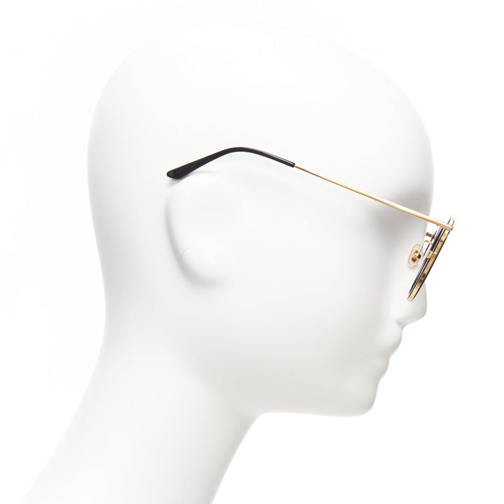 GENTLE MONSTER TOME Supernature gold black cateye reflective purple sunglasses
