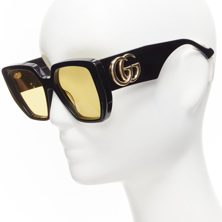GUCCI GG0956S black gold GG logo yellow lens oversized sunglasses