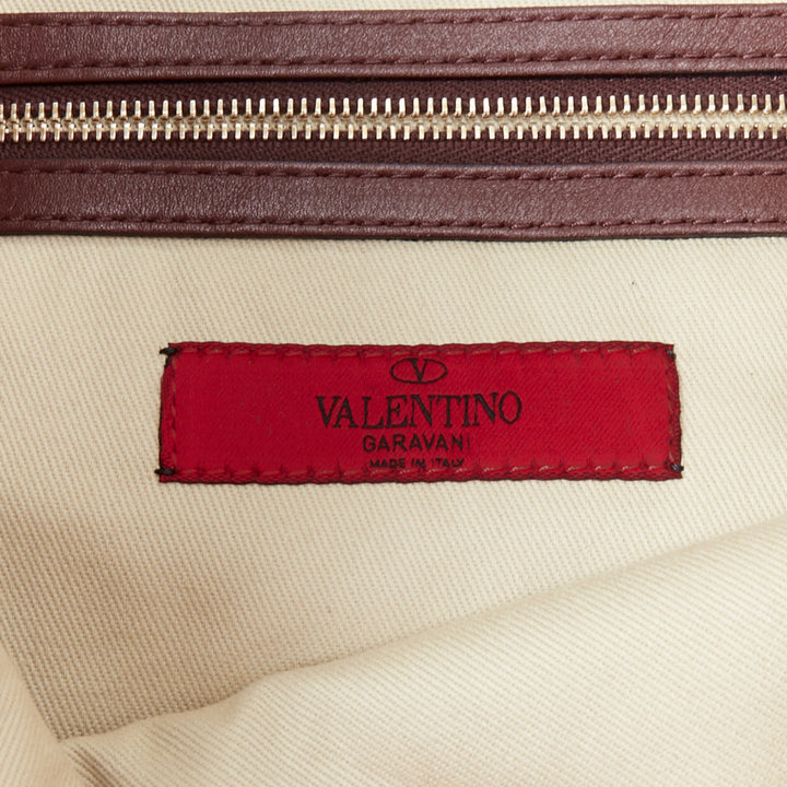 VALENTINO Rockstud rose gold burgundy leather studded logo clutch