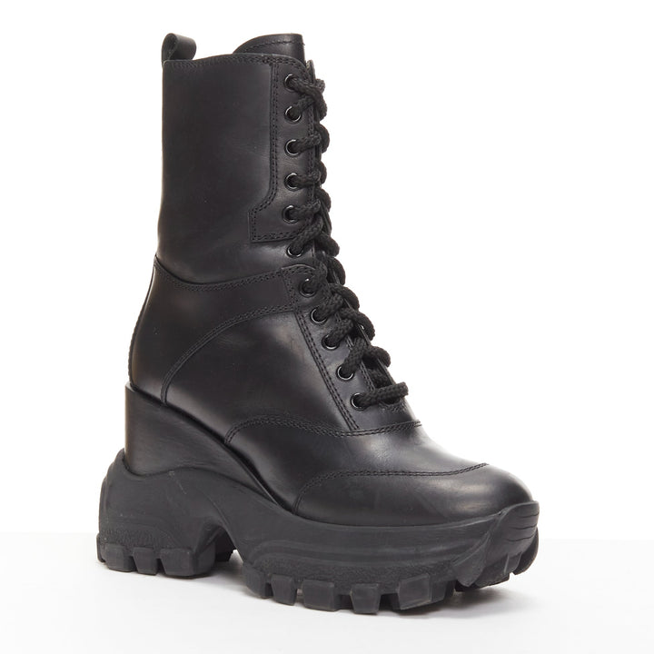 MIU MIU Runway black leather logo lace up chunky wedged military boots EU39