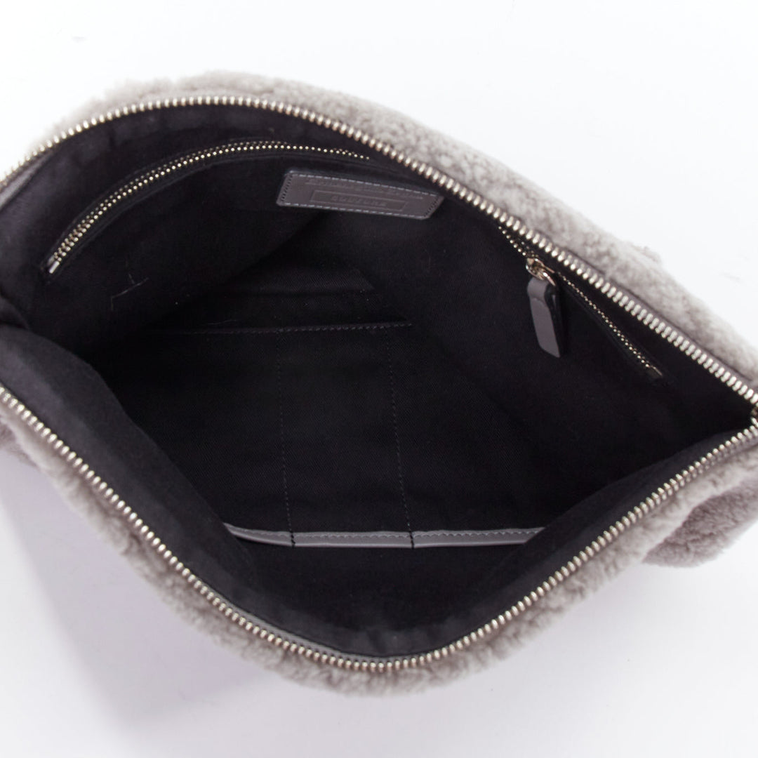 ERMENEGILDO ZEGNA grey lambskin shearling wrist strap zip clutch bag