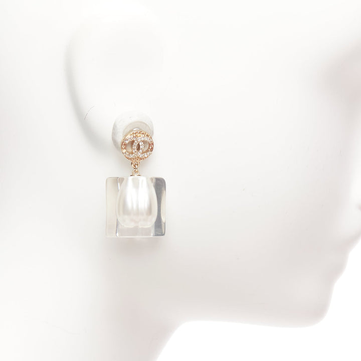 CHANEL A19K CC crystal clear acrylic encased white pearl pin earrings Pair