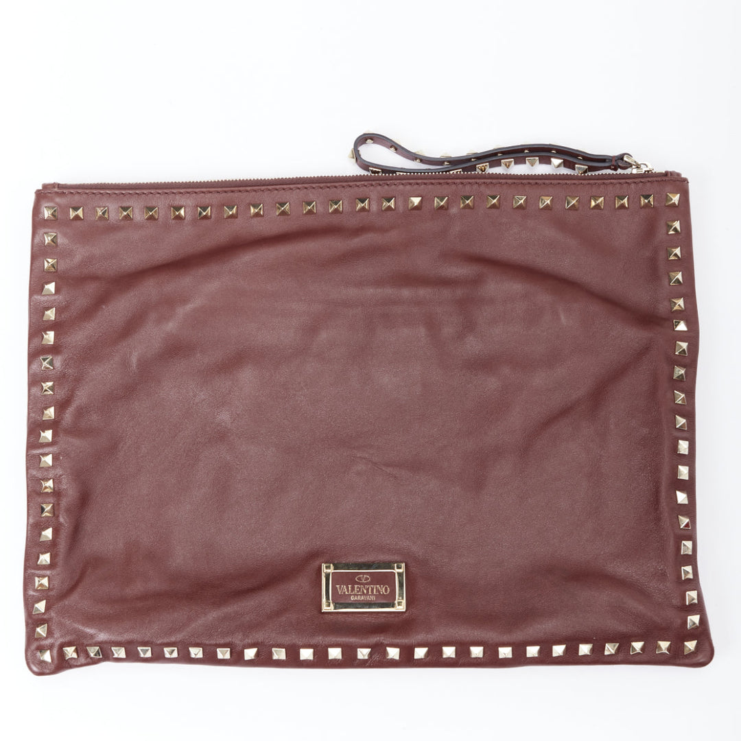 VALENTINO Rockstud rose gold burgundy leather studded logo clutch