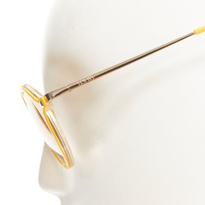 LOEWE SLW450 48 23 L03X yellow round frame brown tint sunglasses
