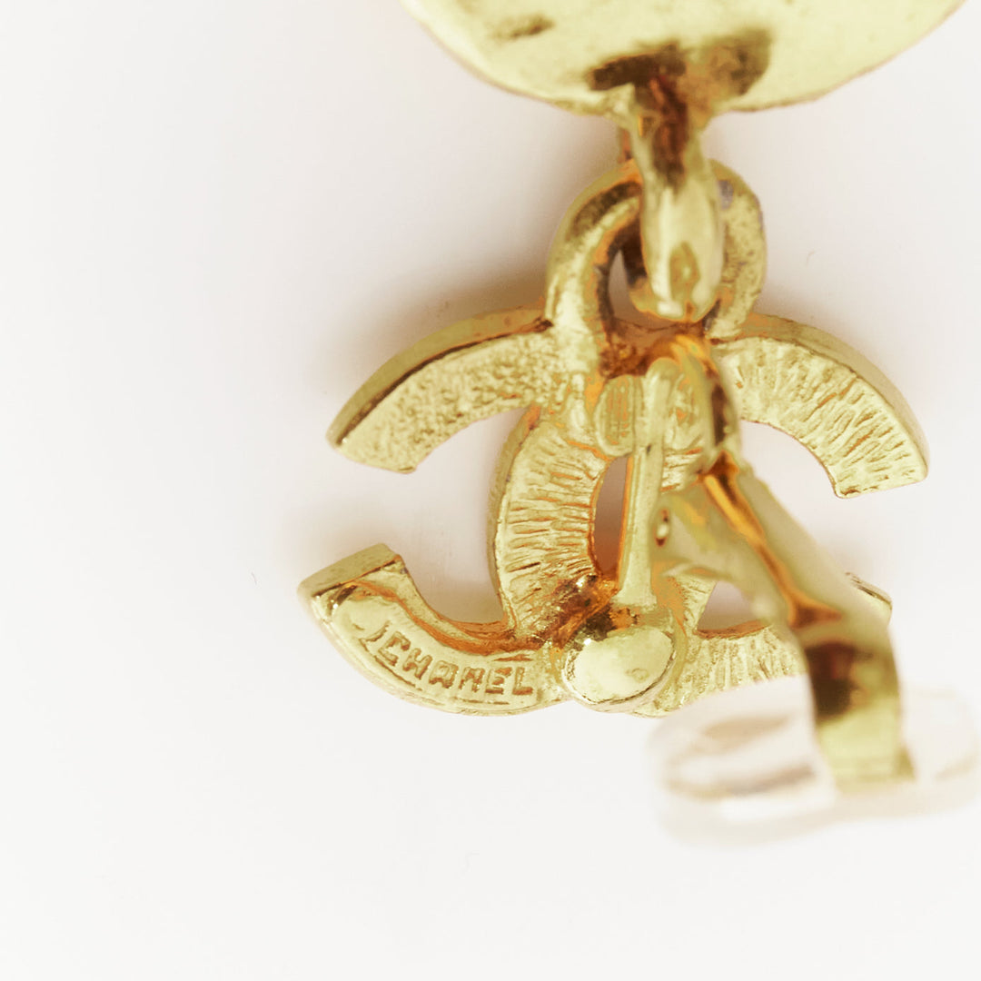 rare CHANEL Vintage gold CC logo cut out hammered coin clip on earrings