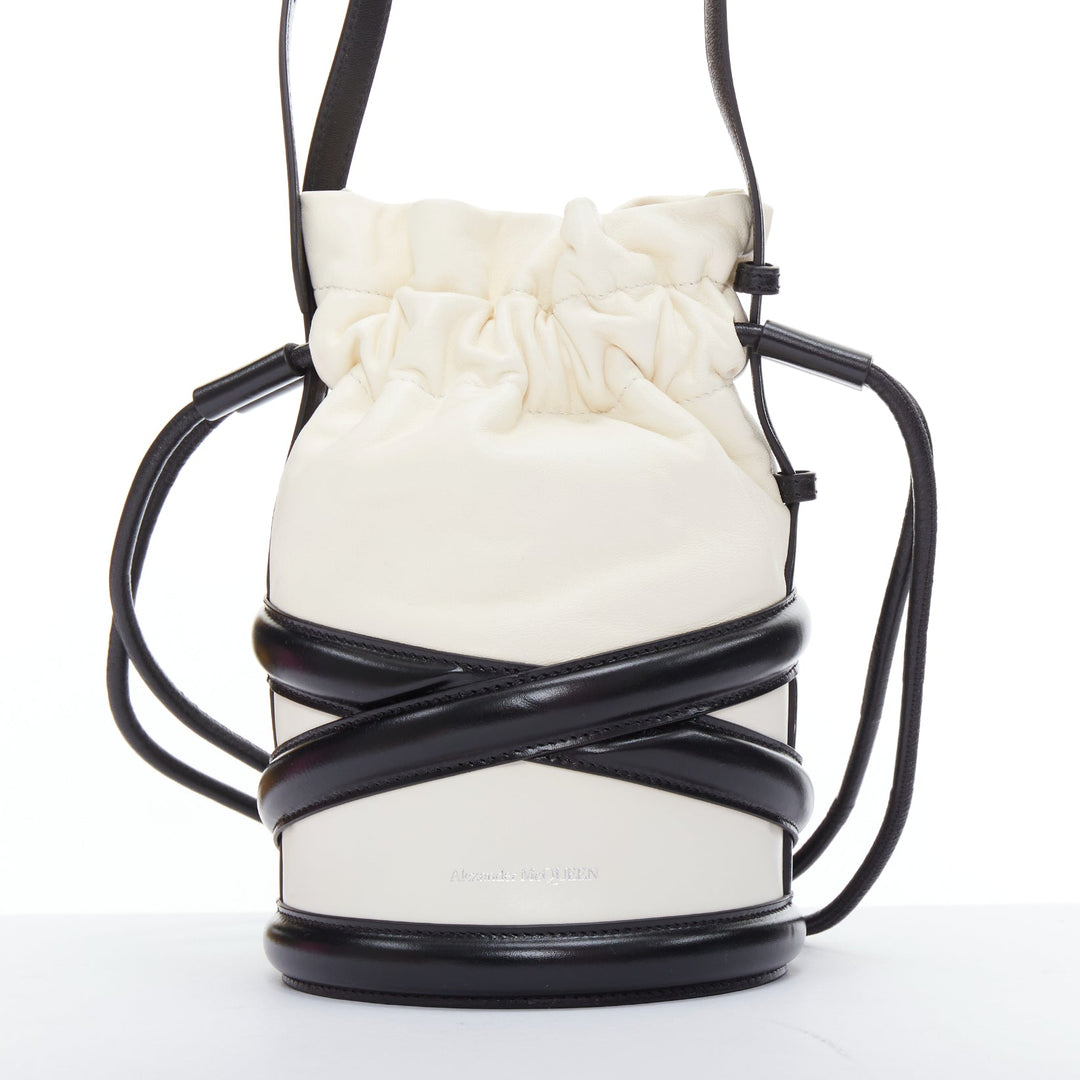 ALEXANDER MCQUEEN Soft Curve AM logo black white leather bucket bag