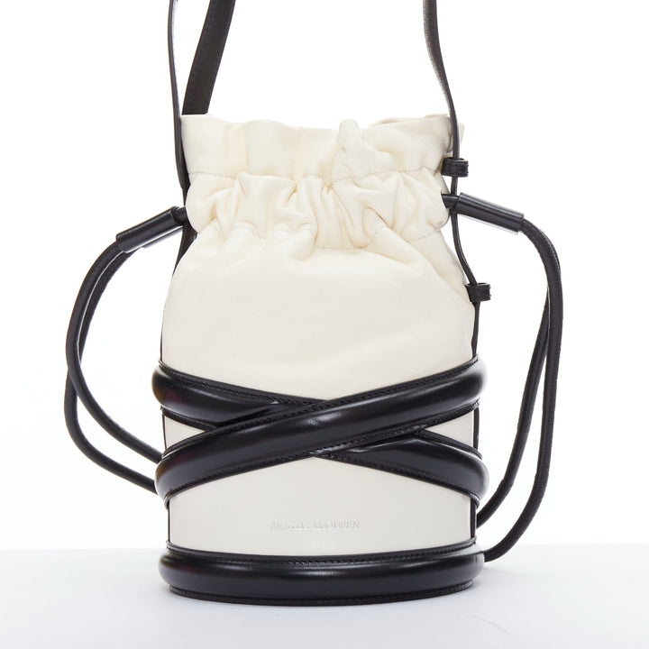 ALEXANDER MCQUEEN Soft Curve AM logo black white leather bucket bag