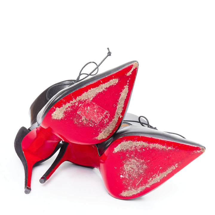 CHRISTIAN LOUBOUTIN Ferme Rouge 100 black cut out pointy pumps EU39