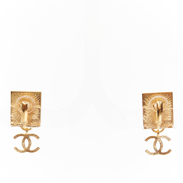 CHANEL G22A gold CC charm Lion Head square stud clip on earrings pair