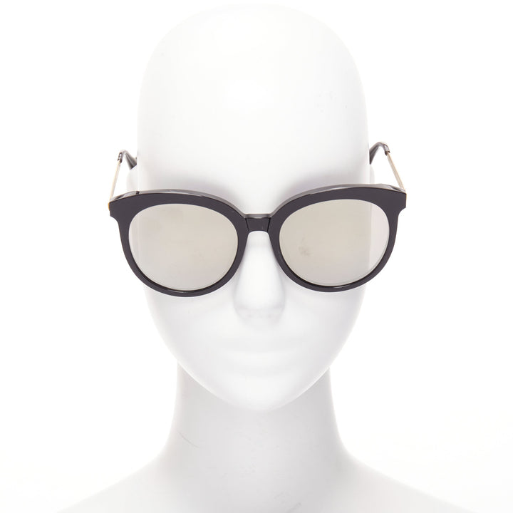 GENTLE MONSTER Lovesome black reflective lens gold oversized sunglasses