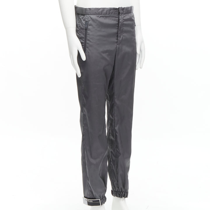 PRADA 2018 logo rubber tab grey gabardine nylon technical jogger pants IT46 S