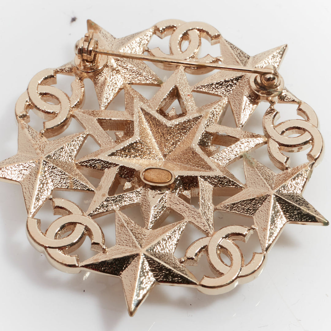 CHANEL A17C crystal CC logo gold tone star motive badge style pin brooch