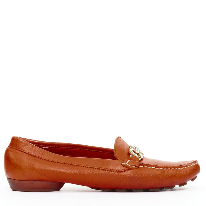 SALVATORE FERRAGAMO burnt orange leather gold logo buckle loafers 6.5