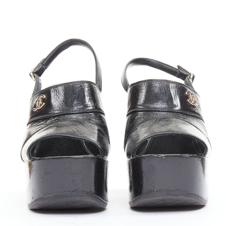 CHANEL 2024 black crumpled leather silver CC logo wedge platform heels EU37.5