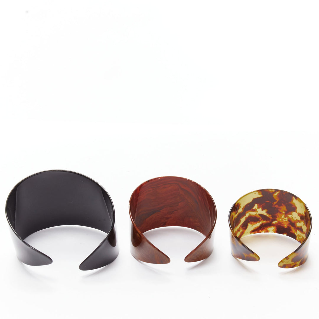 TOGA ARCHIVES brown black acrylic marble print oversized cuffs set