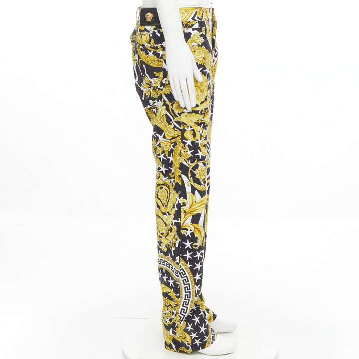 VERSACE 2019 Runway Savage Barocco gold Medusa stud jeans IT32