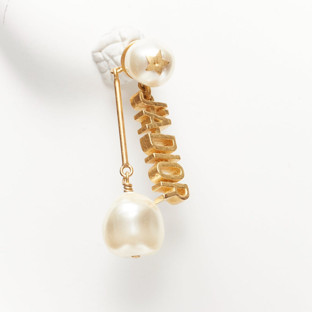 DIOR Tribale J'adior gold pearl logo drop star pin asymmetric stud earrings pair