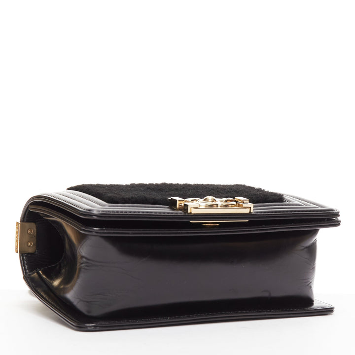 CHANEL Boy Small black shearling leather gold CC push lock chain flap bag