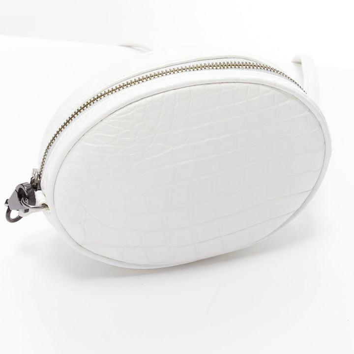 FERIDA YANG Emma white matte scaled leather oval crossbody belt bag