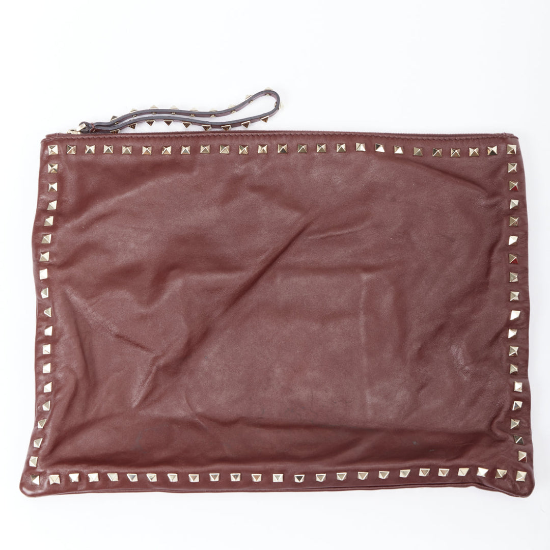 VALENTINO Rockstud rose gold burgundy leather studded logo clutch