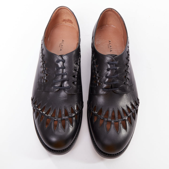 ALAIA Goodyear black leather laser cut out braided brogue EU38