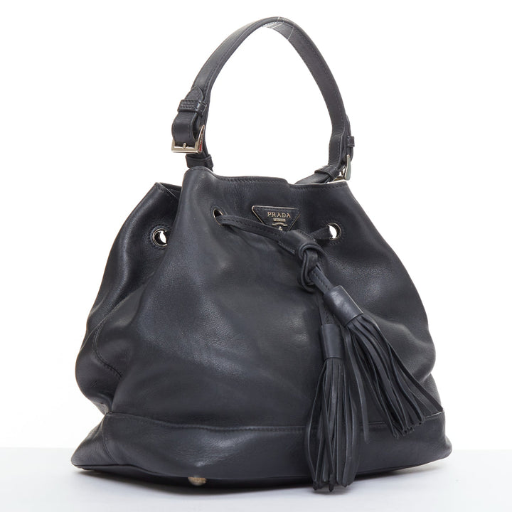 PRADA City Calf Bucket black calfskin leather triangle tassel drawstring bag