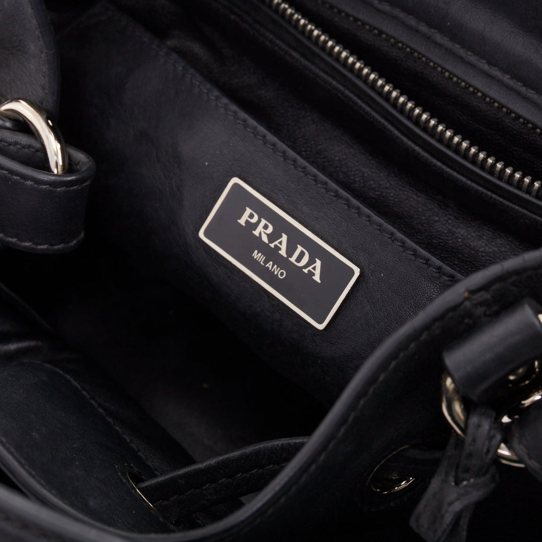 PRADA City Calf Bucket black calfskin leather triangle tassel drawstring bag