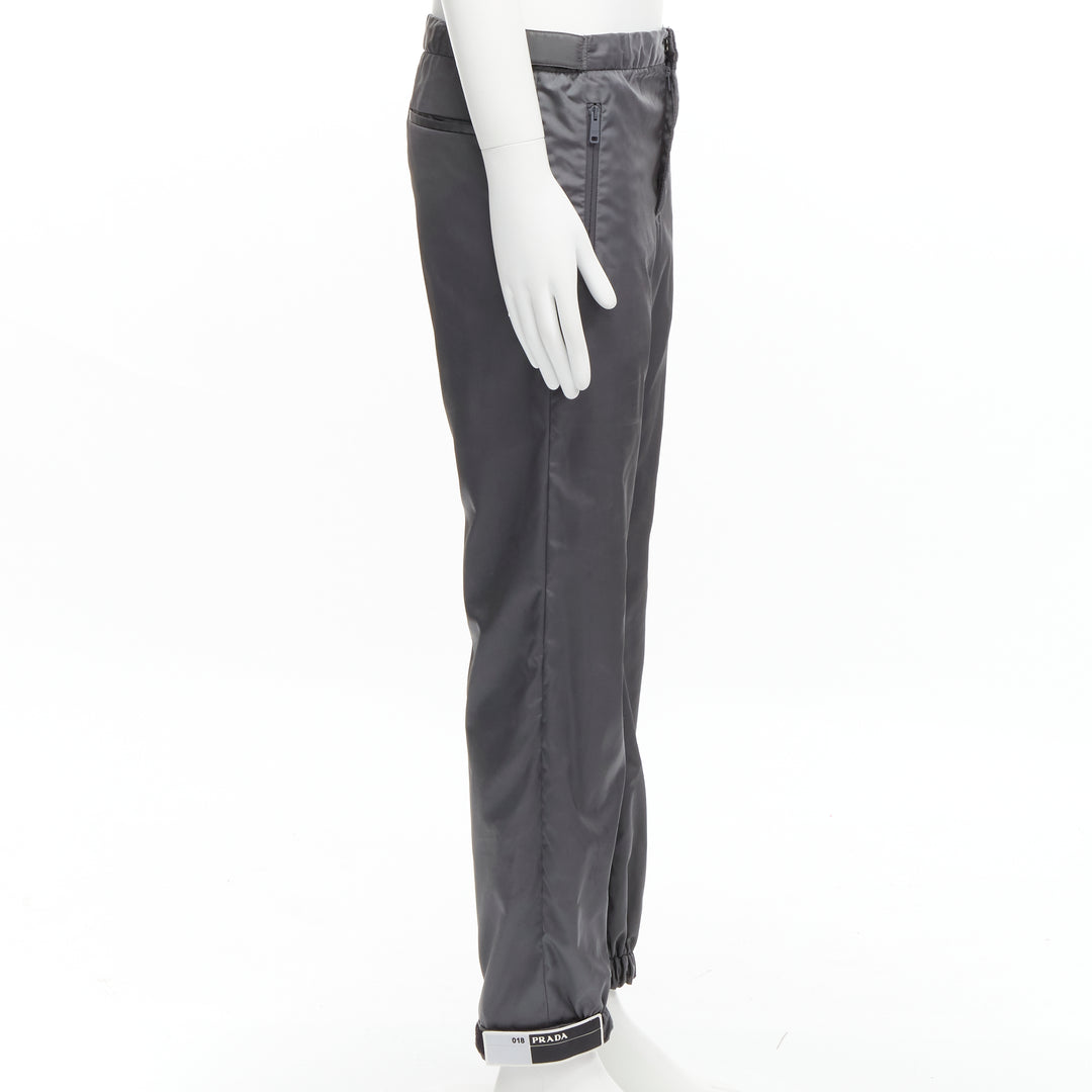 PRADA 2018 logo rubber tab grey gabardine nylon technical jogger pants IT46 S