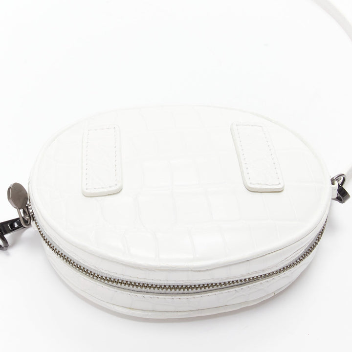 FERIDA YANG Emma white matte scaled leather oval crossbody belt bag