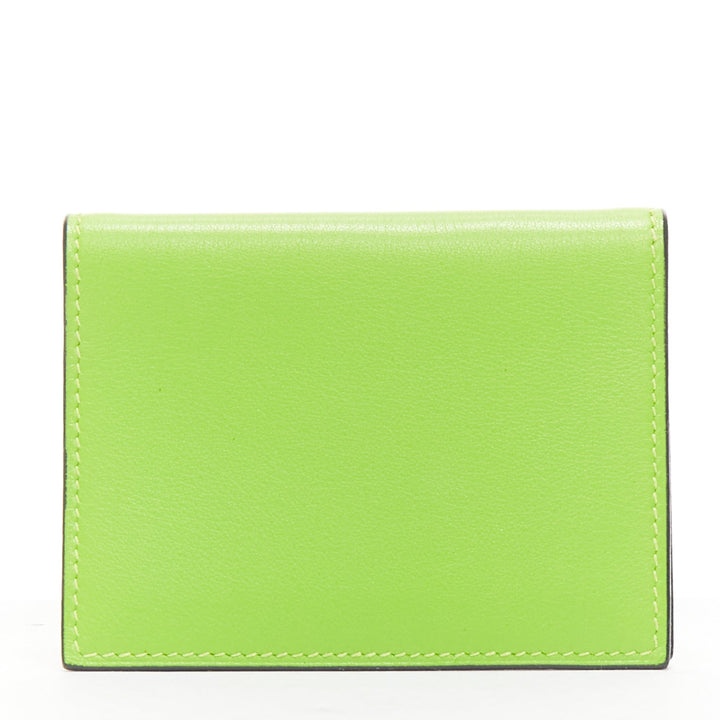 HERMES neon green smooth leather silver hardware bifold cardholder