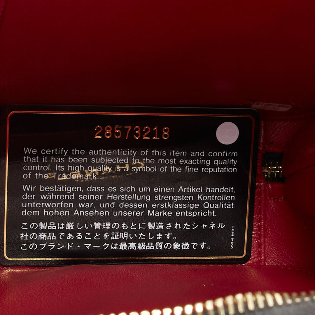 CHANEL N/S Vanity Vertical black filigree gold CC logo small crossbody bag