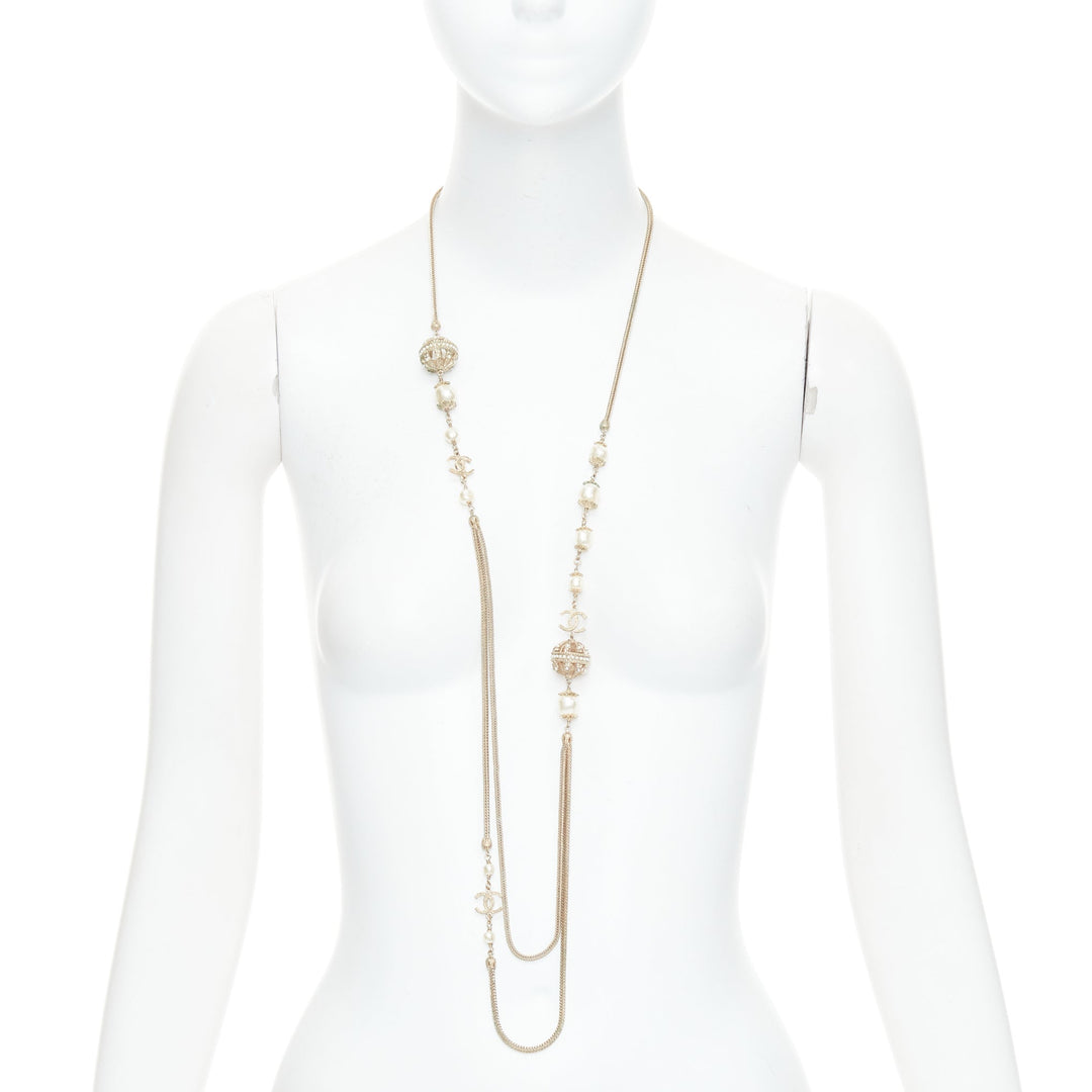 CHANEL B16A gold tone faux pearl CC logo round globes necklace