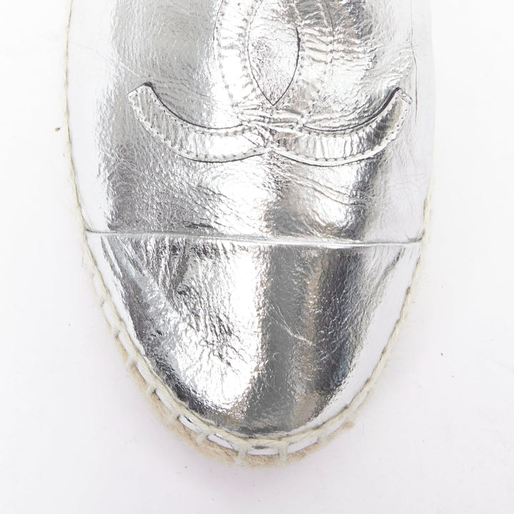 CHANEL metallic silver laminated goatskin CC logo jute espadrilles EU38