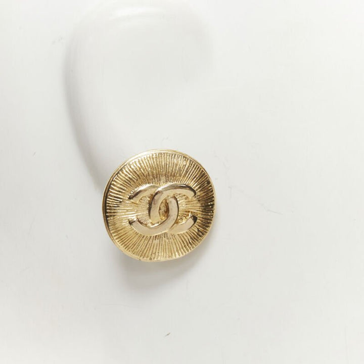 CHANEL Vintage CC logo gold starburst textured clip on earrings